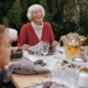 Happy family enjoying dinner in garden